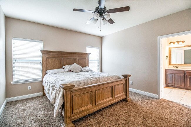 Building Photo - The home has 3 marvelous bedrooms and 2 fu...