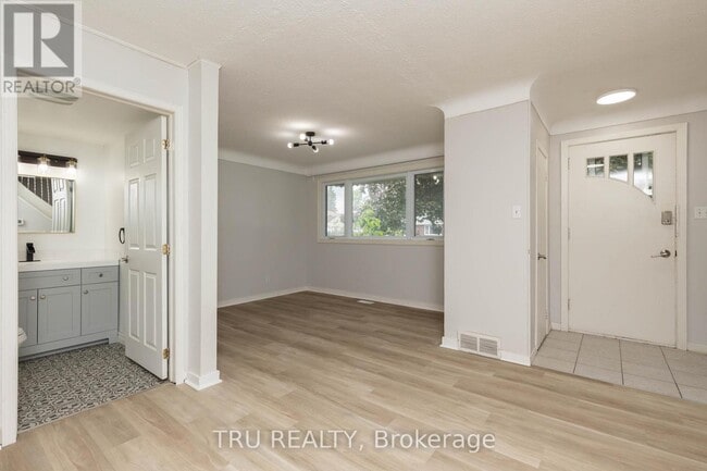Building Photo - 1152 Woodroffe Ave