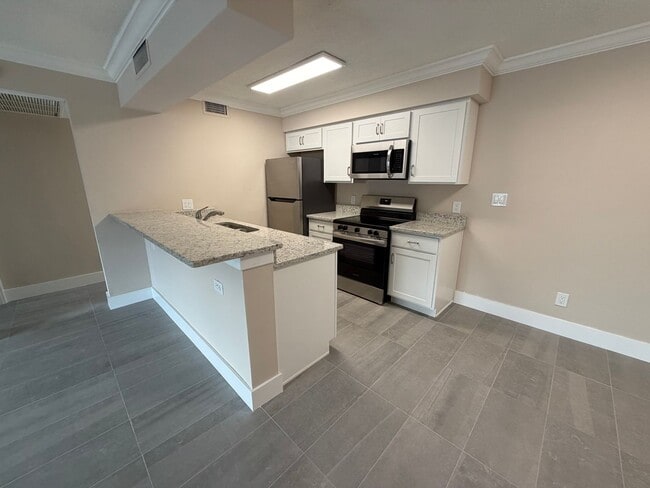 Building Photo - ANNUAL RENTAL - 1 BED / 1 BATH CONDO AT MYSTIC GARDENS