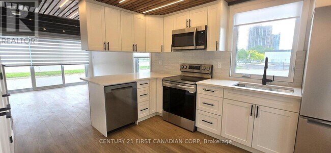 Photo du bâtiment - 857-857 Dundas St