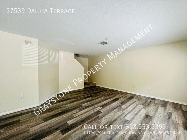 Building Photo - Zephyrhills townhome with three bedrooms a...