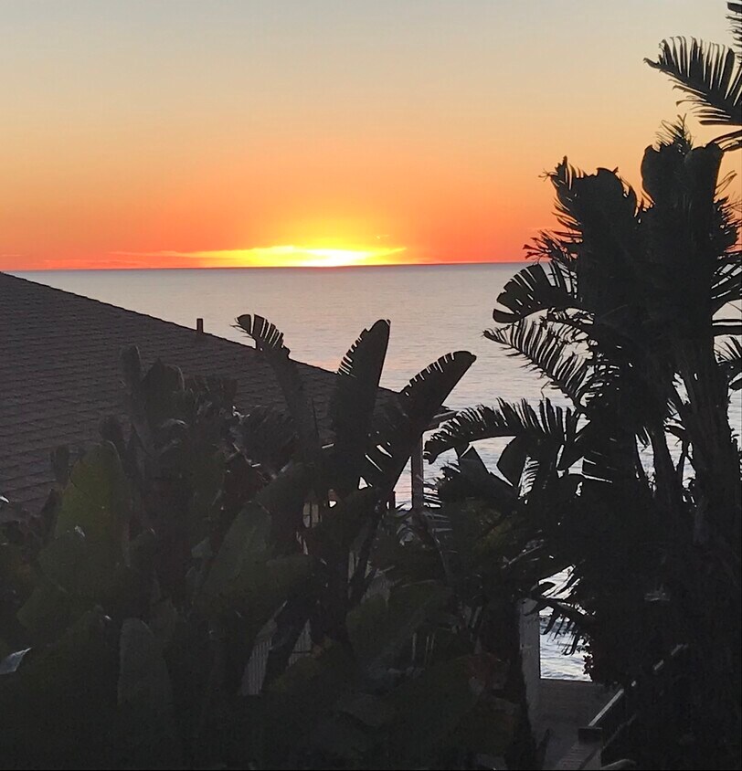 Sunset off Balcony by Front Door - 940 Sealane Dr