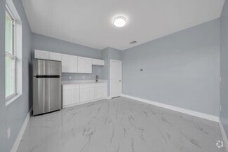 Building Photo - 104 Harry Ave S