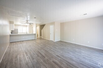 2BR, 2.5BA - 1,282SF - Living Room and Kitchen - Mesa Del Oso