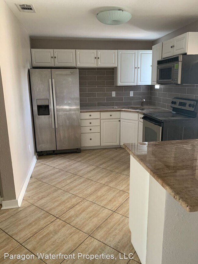 Building Photo - 3 br, 2.5 bath House - 6900 Onyx Drive