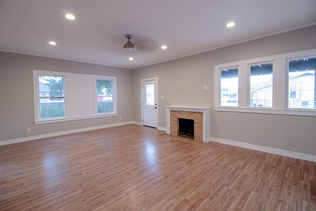 Gas Fireplace and newer laminate floors throughout for ease of maintenance - 203 S Avenue B