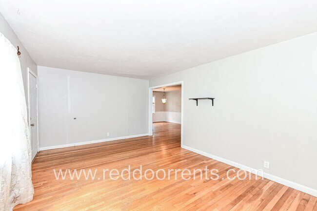 Building Photo - Spacious Family Haven: 4-Bedroom Gem on Ea...