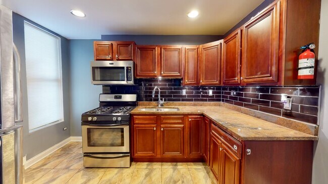 Stainless-steel refrigerator, range stove, and microwave stove, and - 10450 S Maryland Ave