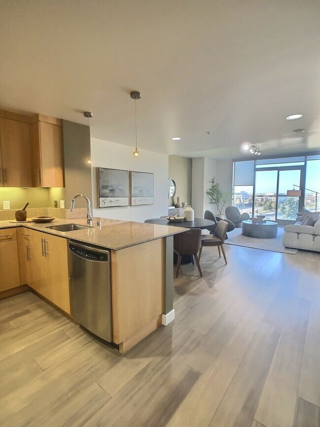 Building Photo - Gorgeous 1 Bedroom Condo at Axis with Den