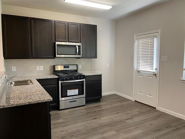 Building Photo - 4919 Blue Jacaranda Wy
