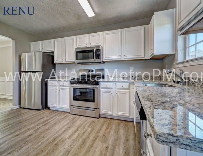 Building Photo - Now Available! 4 bedrooms 2.5 baths