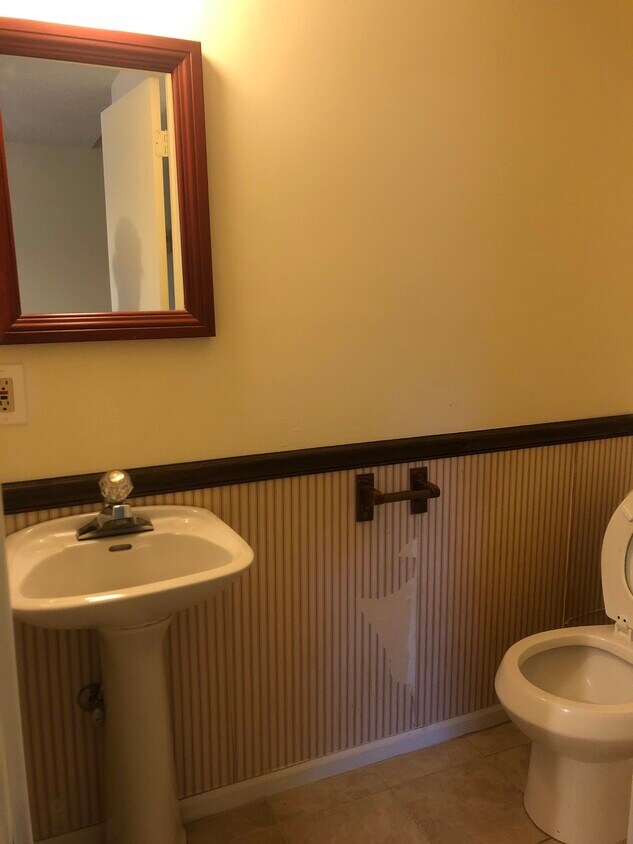 1/2 bath, storage under stairs - 123 C Liberty Road