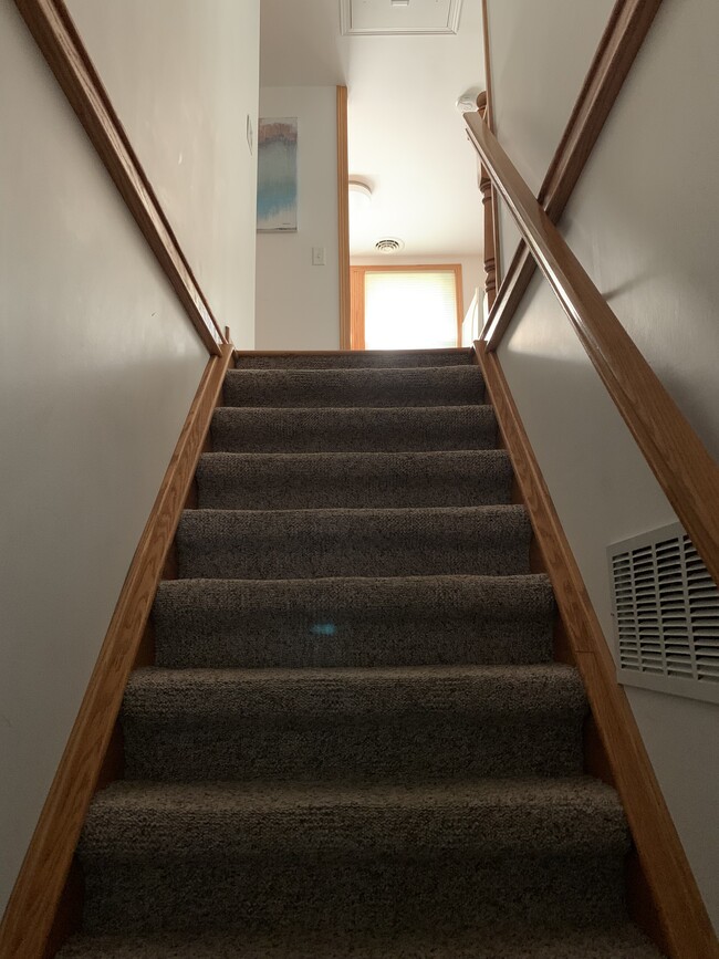 Stairs to unit. - 1111 N Daisy Ln