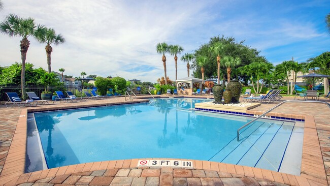 Surrounded by lush tropical landscaping, comfortable lounge seating, and inviting outdoor spaces, the pool is the perfect place to relax, recharge, and soak up the sunshine. - Beachway Links