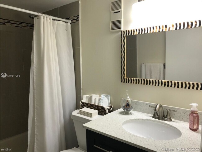 Foto del edificio - 2 br, 2 bath Condo - 8810 SW 132nd Pl # 108DN