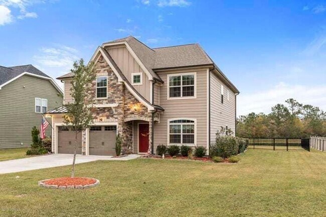 Building Photo - 4 Bedroom, 2.5 bath home in Mimosa Bay Com...