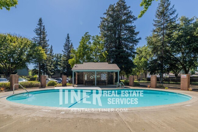 Building Photo - Charming Three Bedroom Home