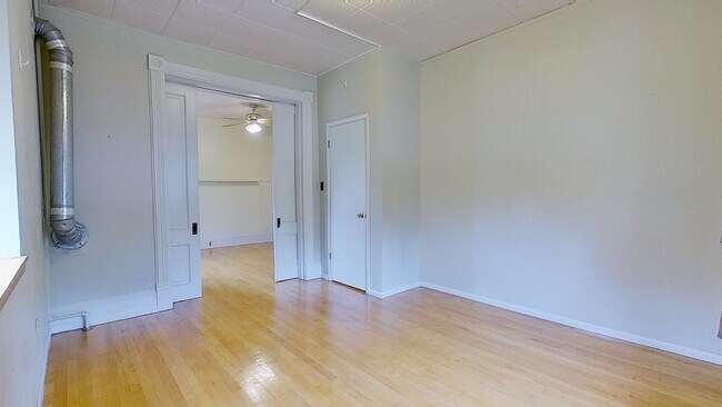 Bedroom with Pocket Doors - 509 Madison Ave