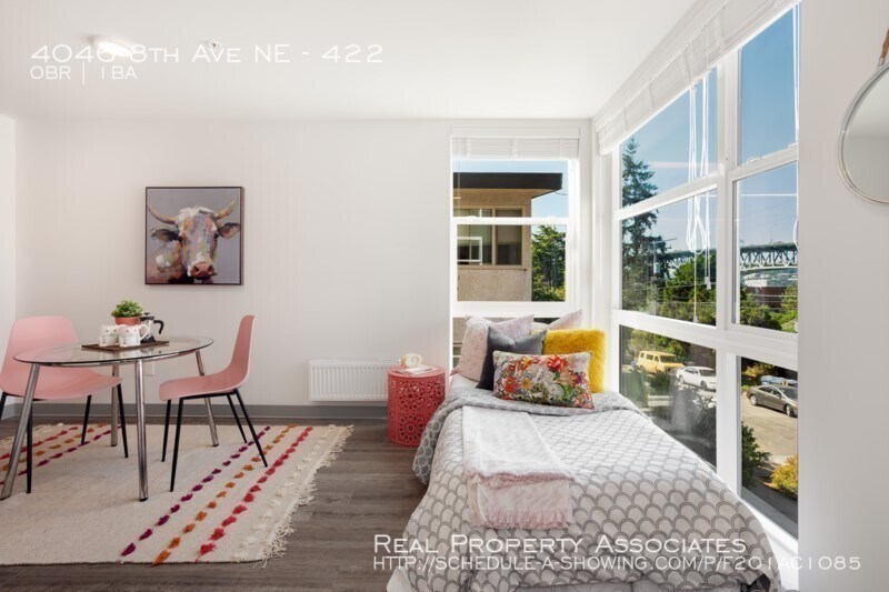 Primary Photo - Top floor, corner unit, 10 min walk to UW