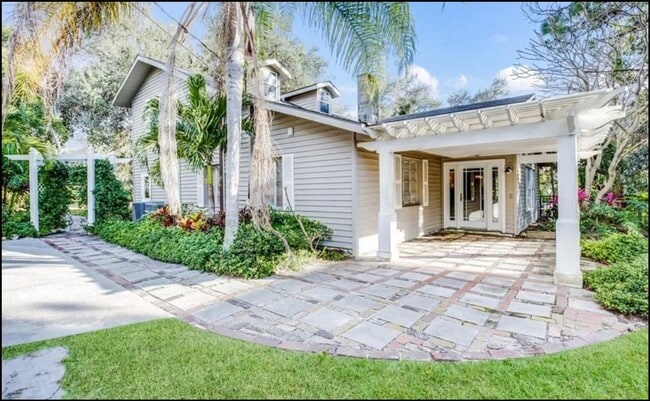 Building Photo - Furnished home on Palma Sola Bay with dock...