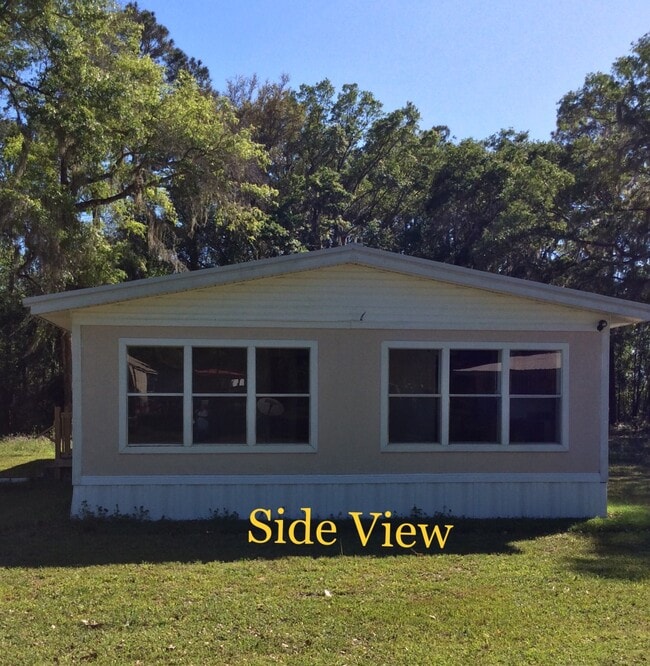 Building Photo - 8047 SW 44th Ave