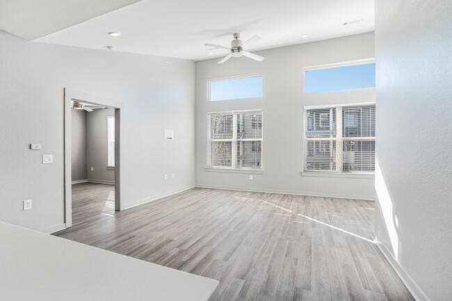 living room with vaulted ceilings - The Pointe North Hills