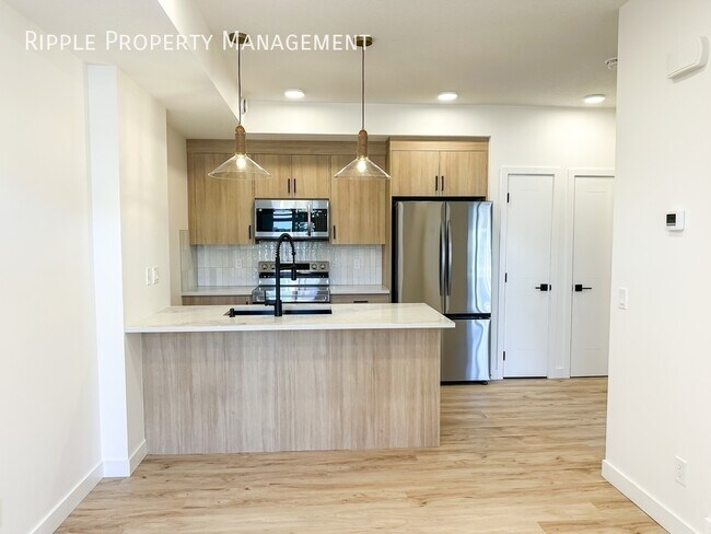 Photo du bâtiment - GORGEOUS 1 BED/ 1 BATH TOWNHOUSE