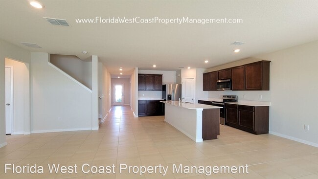 Building Photo - 4 br, 2.5 bath House - 8431 Abalone Loop