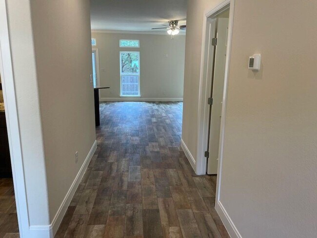 Building Photo - Enjoy the upscale construction of this pro...