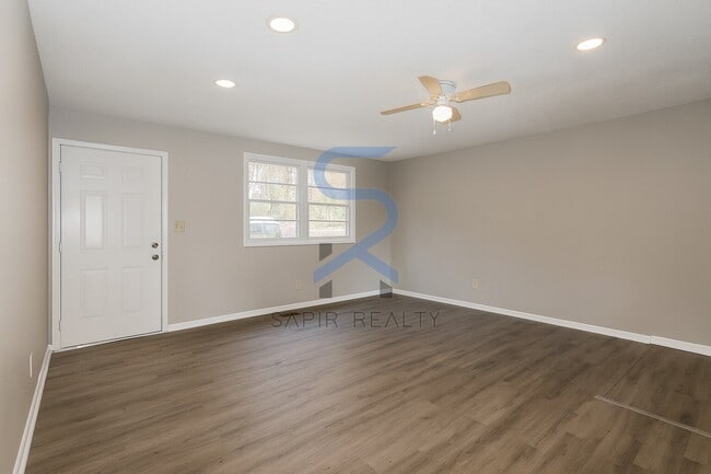 Building Photo - Move in before November 30th and choose your reward: a $250 Amazon Gift Card or a 55 Smart TV!