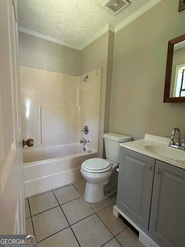Foto del edificio - 4704 High Oak Dr