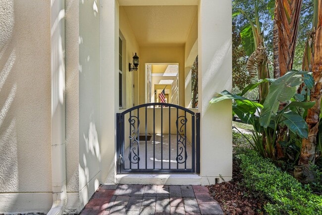 Building Photo - Gorgeous 3/3 Townhouse in VillageWalk of Lake Nona (Gated)