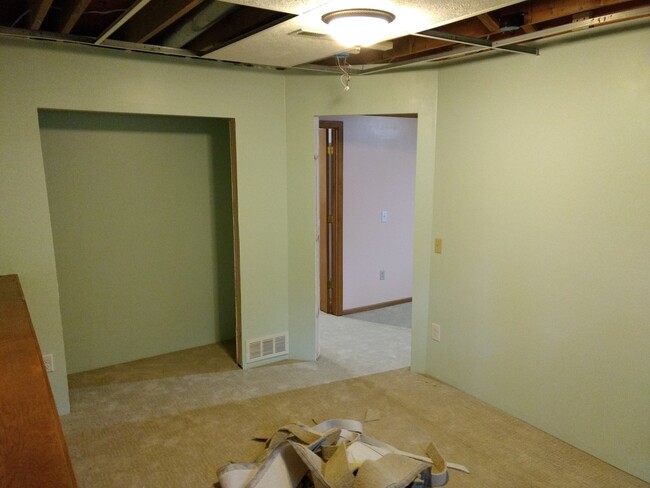 Corner of SW bedroom, facing doorway and closet. (6) Are you sure you want doors in here? It has such a nice open feel right now! - 17218 Finch Path