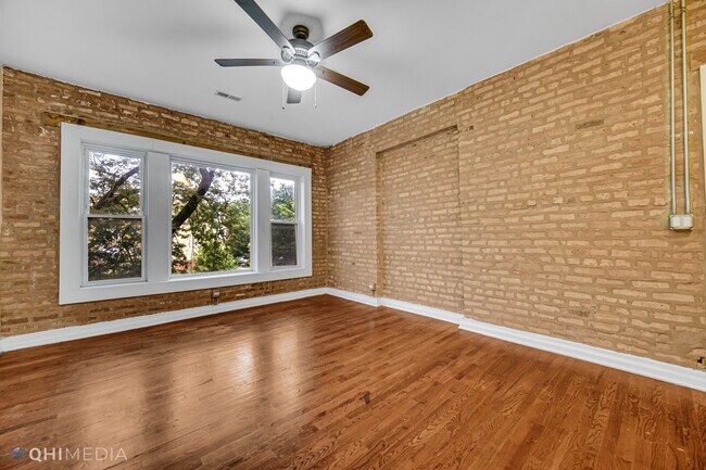 Building Photo - 6155 S Vernon Ave
