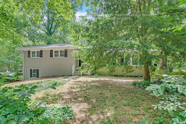 Foto del edificio - 5747 Woodland Dr