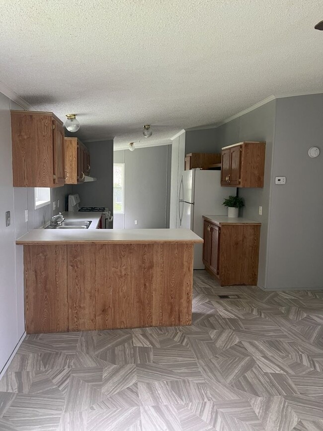 Building Photo - CENTRALLY LOCATED HOME IN CADILLAC