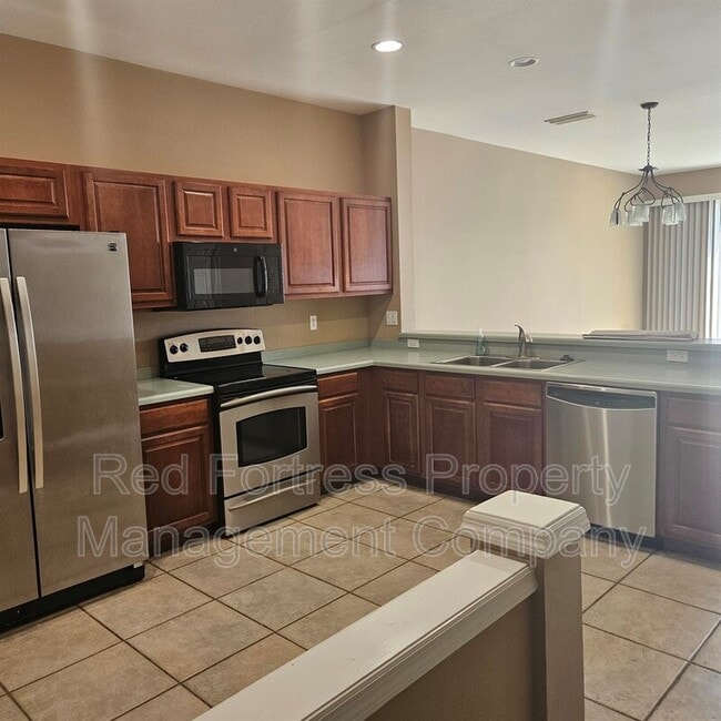 Building Photo - 8271 Village Edge Cir