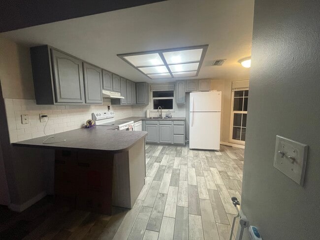 Kitchen opens to the family room - 6149 Staunton Dr