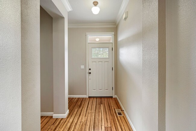 Building Photo - Custom-Built 4BR/2.5BA Two-Story Near Woodstock — Quartz Island Kitchen, Gas Fireplace & Fenced Y...