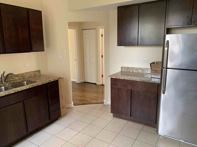 Photo - 7219 S Langley Ave Apartment