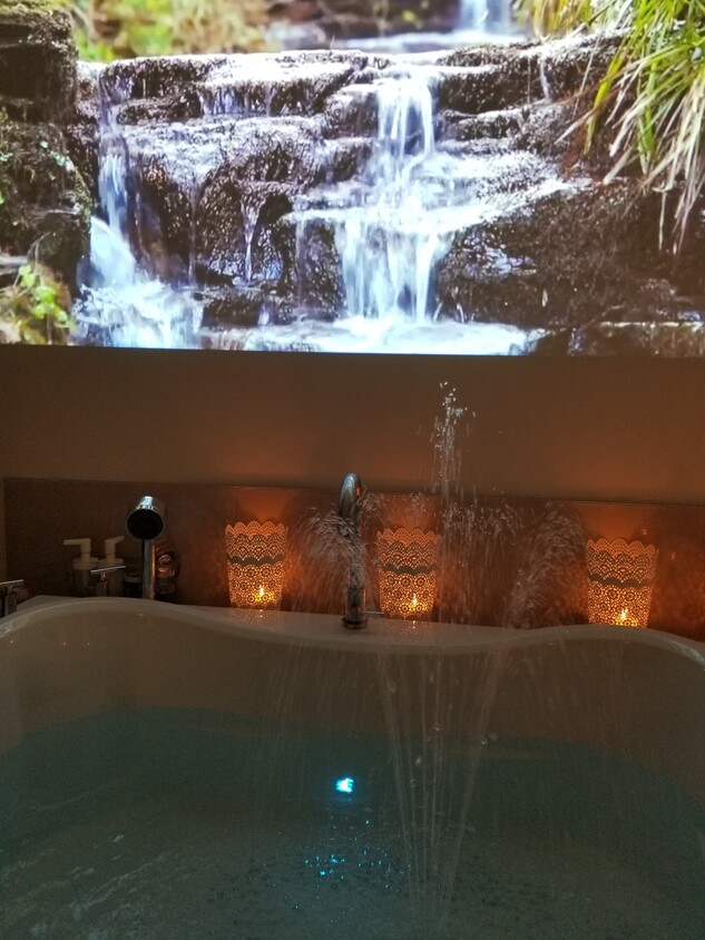 Full size soaker bathtub with projection live art on the wall - 6671 152 St