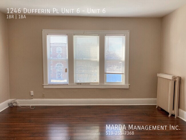 Building Photo - CHAMRING 1 BED/1 BATH APT ON DUFFERIN & GILES + HYDRO!