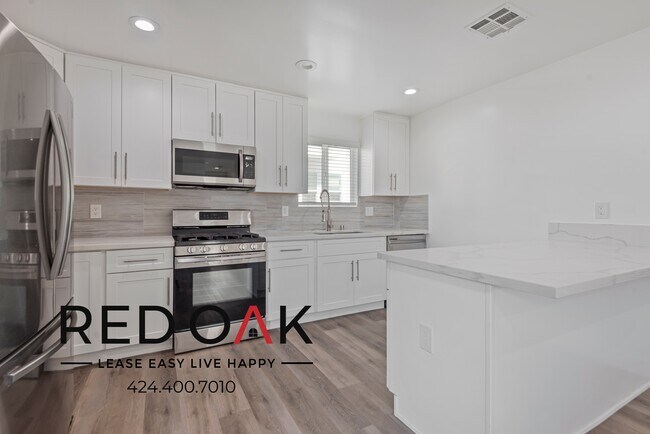 Building Photo - ~ One Month FREE! ~ Sun Drenched Three Bed...