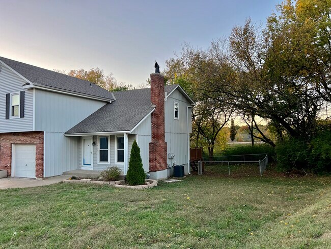 Front door/front yard/side yard - 14106 W 87th Terrace