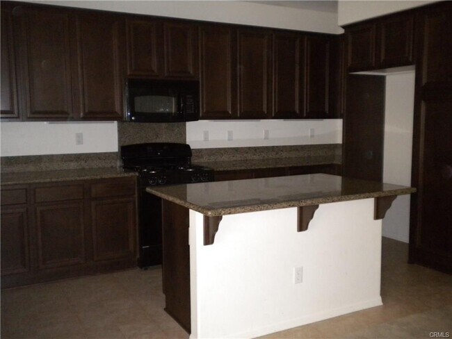 Foto del edificio - 15940 Moonflower Ave