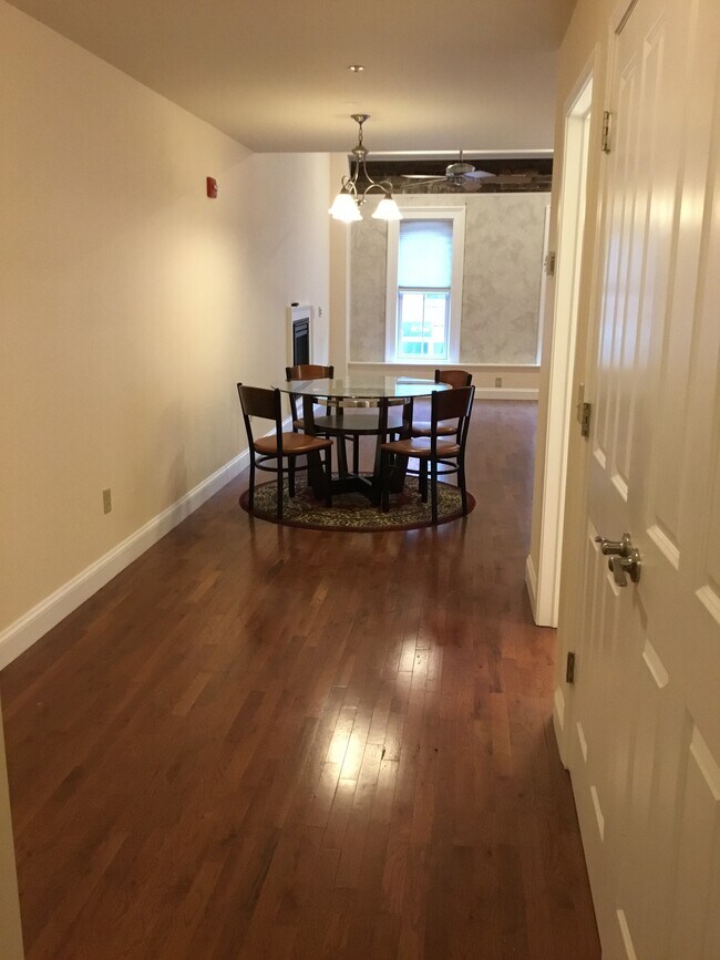 Hallway to living area - 68 W Market St