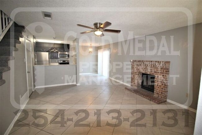 Building Photo - A charming 2-bedroom, 1.5-bathroom townhome now available for rent!