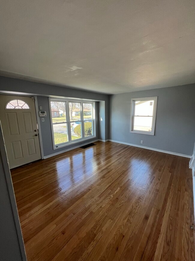 Living room/Front door - 1469 Forest Ave