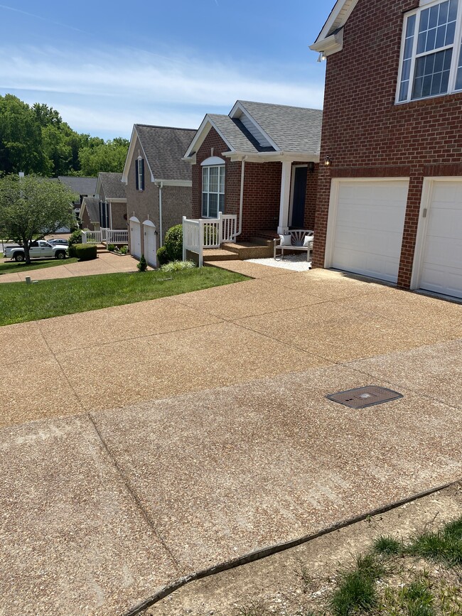 Extra parking pad and two car garage - 709 Warmstone Ct