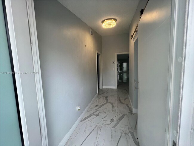 Building Photo - 5471 W 21st Ct